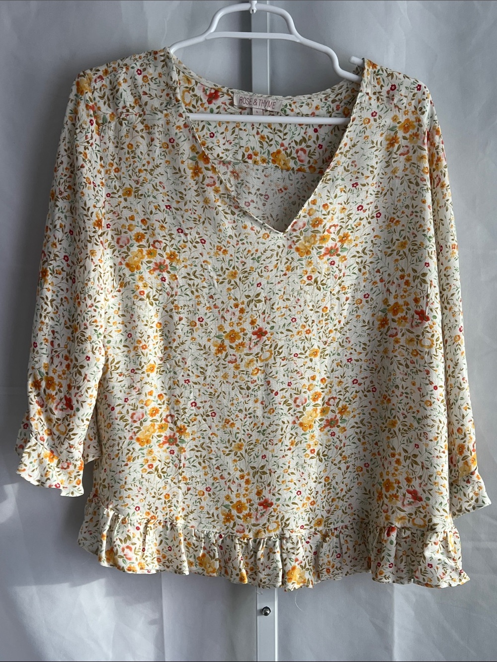 Rose & Thme Cream Floral V-Neck Ruffle Hem Blouse